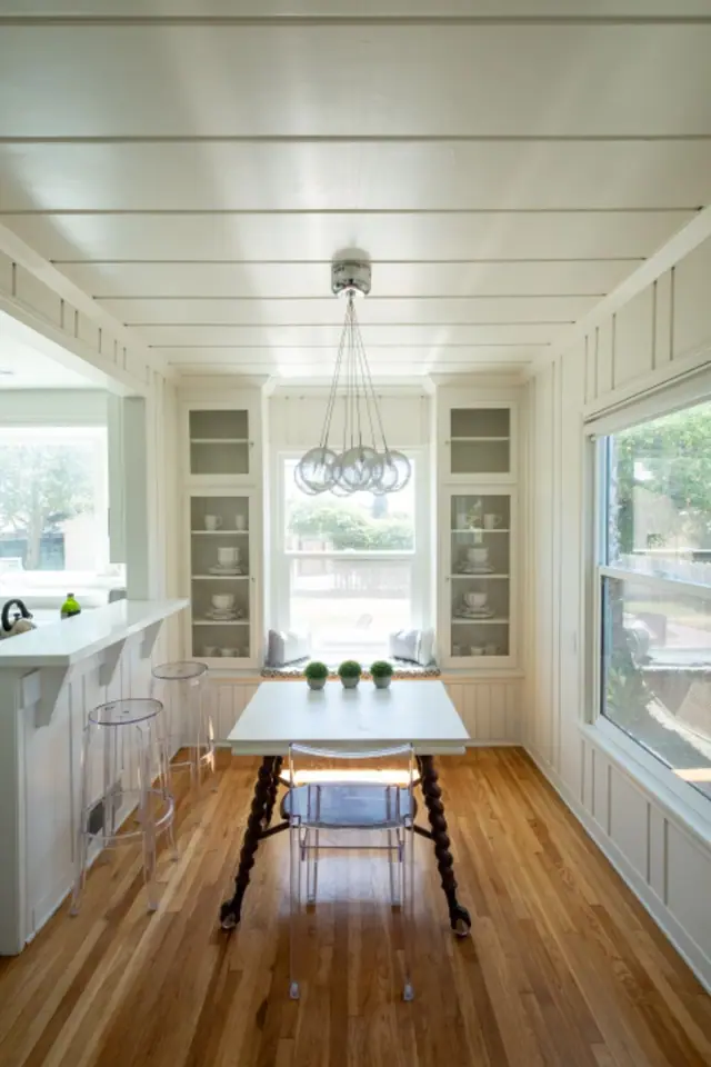White kitchen with a window seat