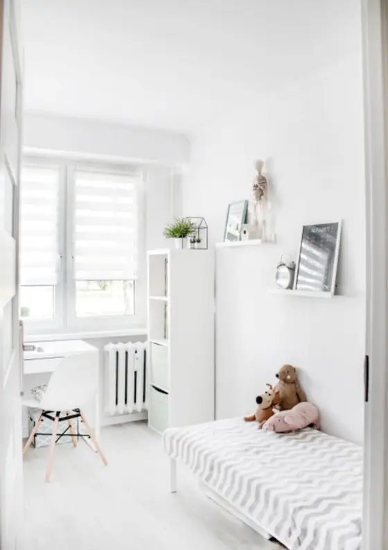 White bedroom with a window